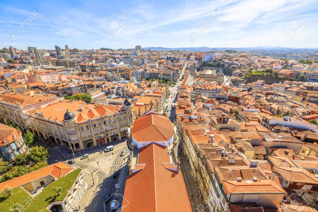 Aerial view of historic city center of Porto in Portugal from Clerigos Tower, one of the landmarks and symbols of Oporto. Urban skyline landscape.